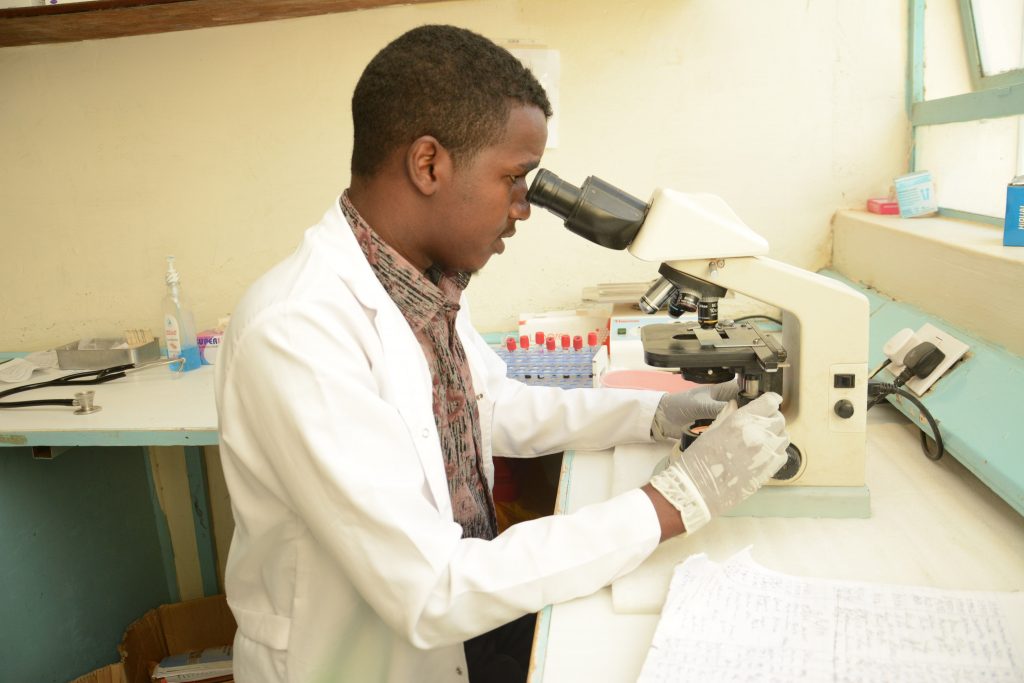 Abdiaziz Yusuf conducting lab analysis at Garissa County Referral Hospital